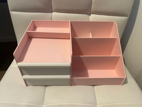 Desk organizer holding pens and accessories