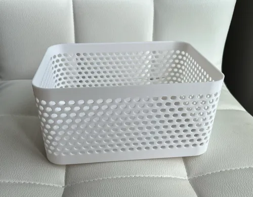 Organizer box holding stationery and small items