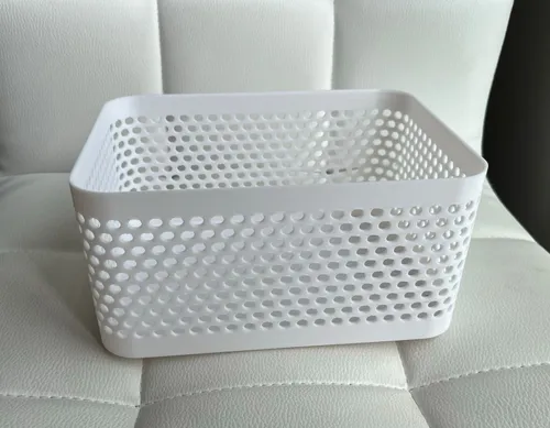 Organizer box holding stationery and small items