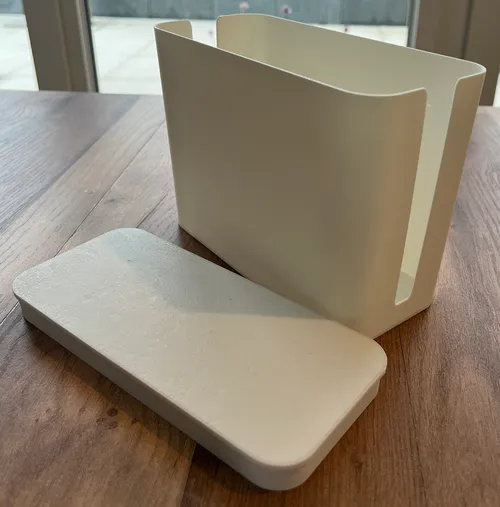 Power supply box hiding cables and adapters