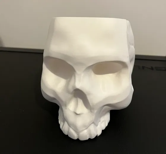 Hanging skull planter